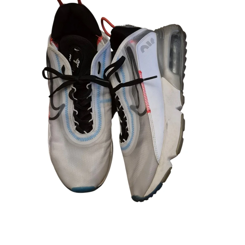 Nike Silver and‎ Black Athletic Shoes Sleek Design